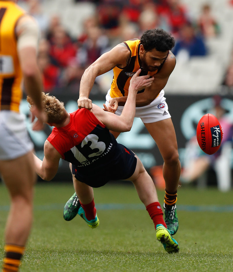 AFL 2016 Rd 20 - Melbourne v Hawthorn MELBOURNE, AUSTRALIA - AUGUST 06: Cyril Rioli of the Hawks and Clayton Oliver of the Demons collide during the 2016 AFL Round 20 match between the Melbourne Demons and the Hawthorn Hawks at the Melbourne Cricket Ground on August 06, 2016 in Melbourne, Australia. (Photo by Michael Willson/AFL Media)